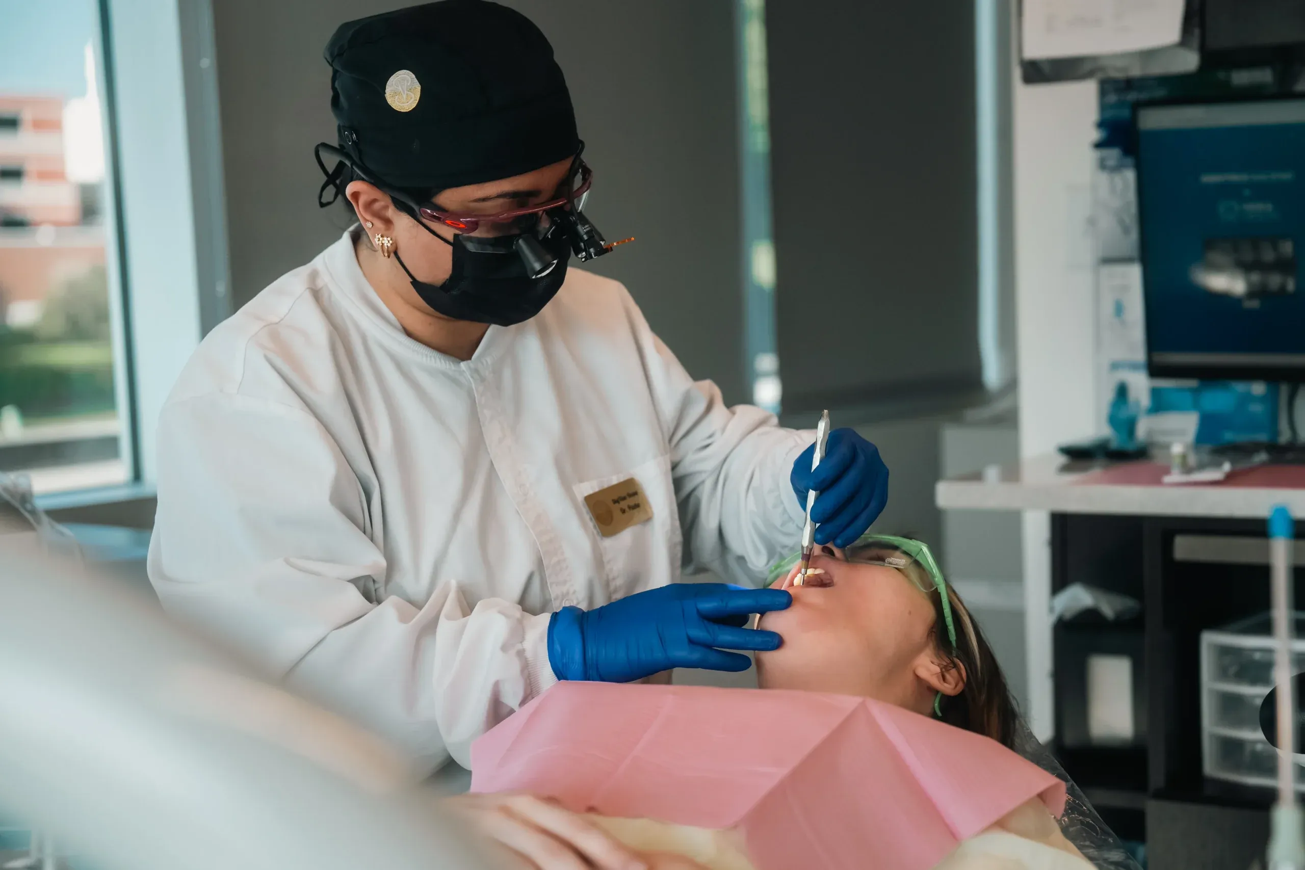 A Skyview Dental hygienist cleaning a patient’s teeth in Noblesville