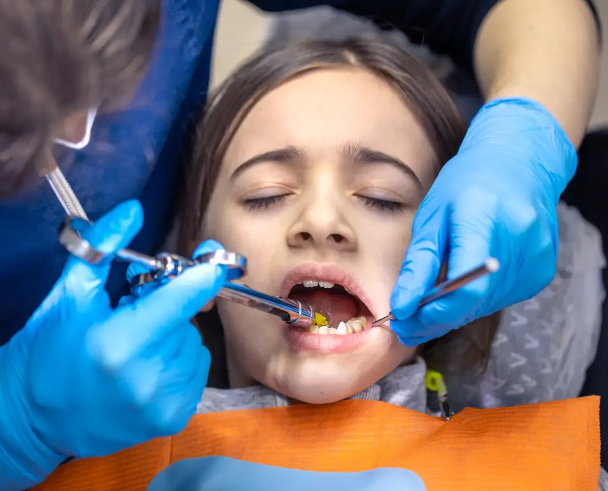 Child receiving a dental check-up
