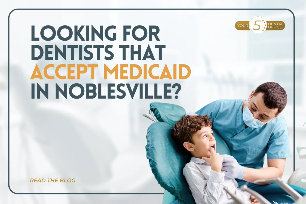 Dentist and young patient in dental chair, Noblesville, Indiana, accepting Medicaid.