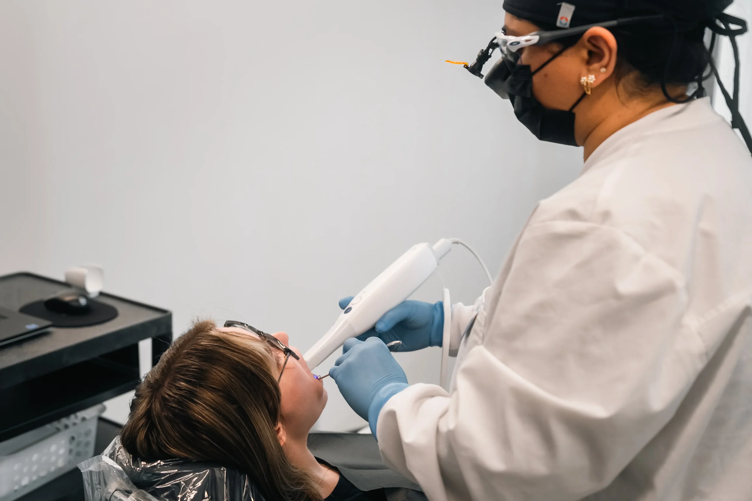 Dental treatment being performed by Dr. Farheen Pasha
