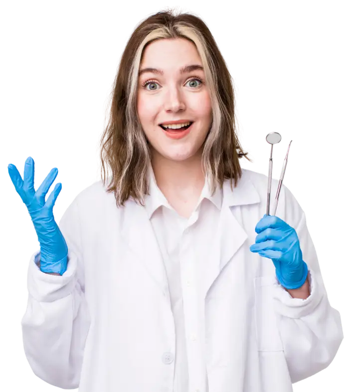 Smiling dental patient in white coat holding dental tools, representing Skyview Dental in Noblesville.